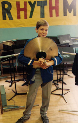 Willie played cymbals in the middle-school marching band.